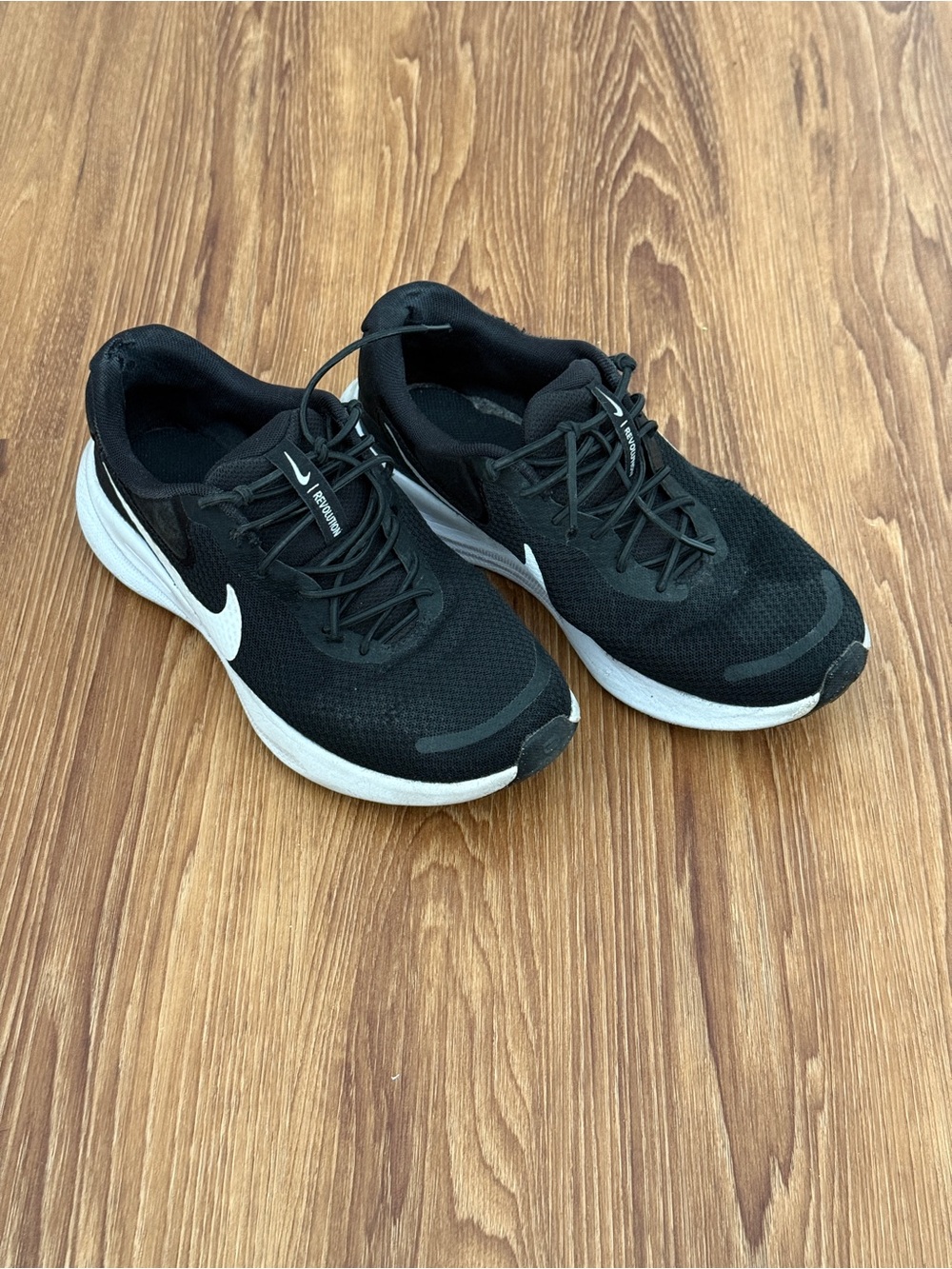 Nike Men's Black Running Sneakers with White Swoosh